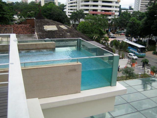 Glass fronted cantilevered Jacuzzi above the entrance